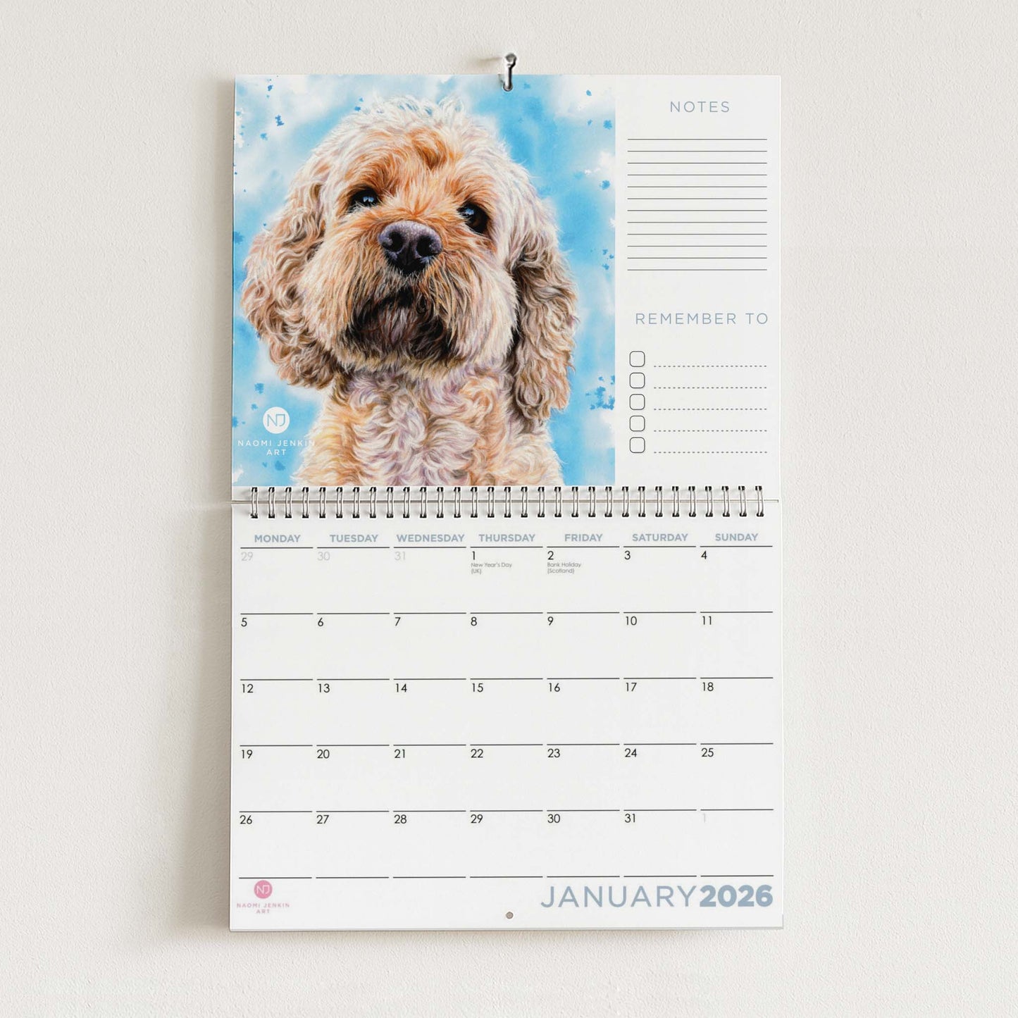 2026 Calendar with a cockerpoo dog on a blue background - Naomi Jenkin Art