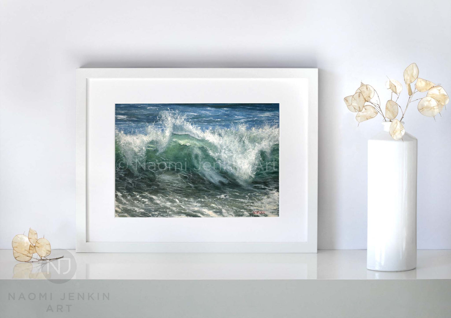 Framed fine art seascape print 'Sea Spray' on a shelf setting