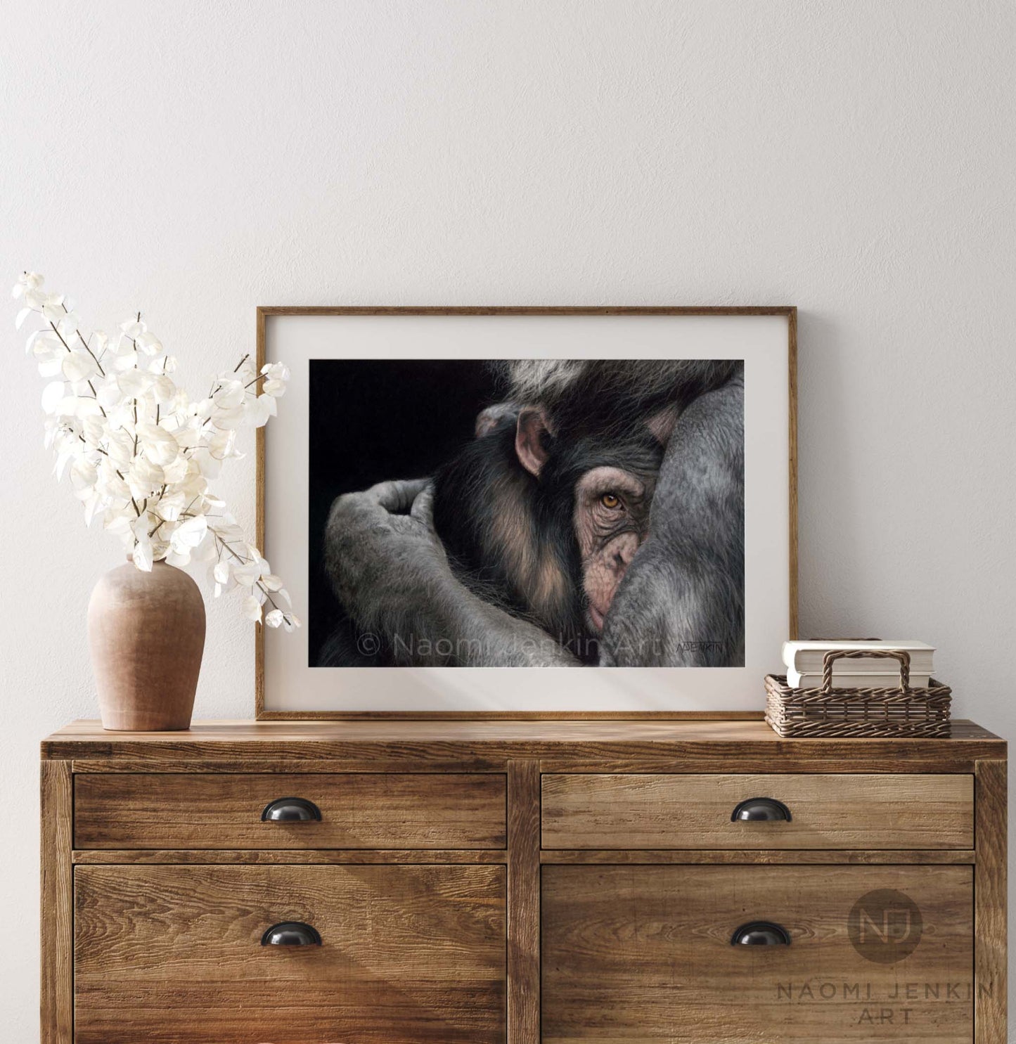 Framed chimpanzee drawing "Embrace" by wildlife artist Naomi Jenkin Art.