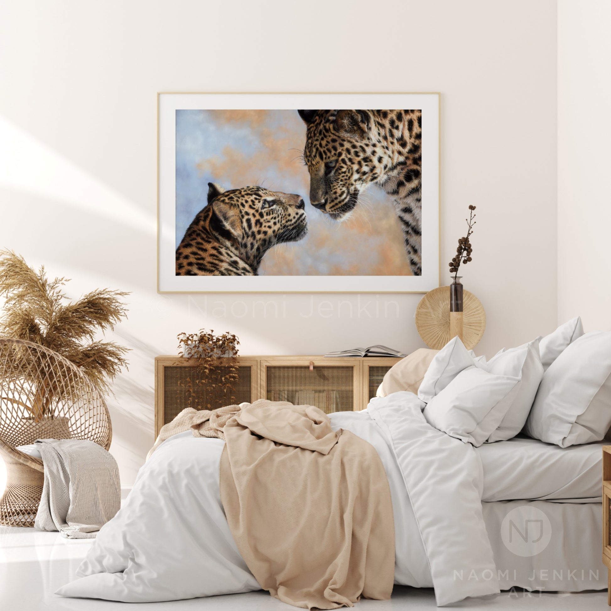 Framed leopard art print in a bedroom setting by wildlife artist Naomi Jenkin Art