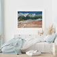 Framed wave print in a bedroom setting by seascape artist Naomi Jenkin Art