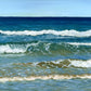 Original seascape oil painting of gentle waves at the shoreline under a bright blue sky by Cornwall artist Naomi Jenkin.