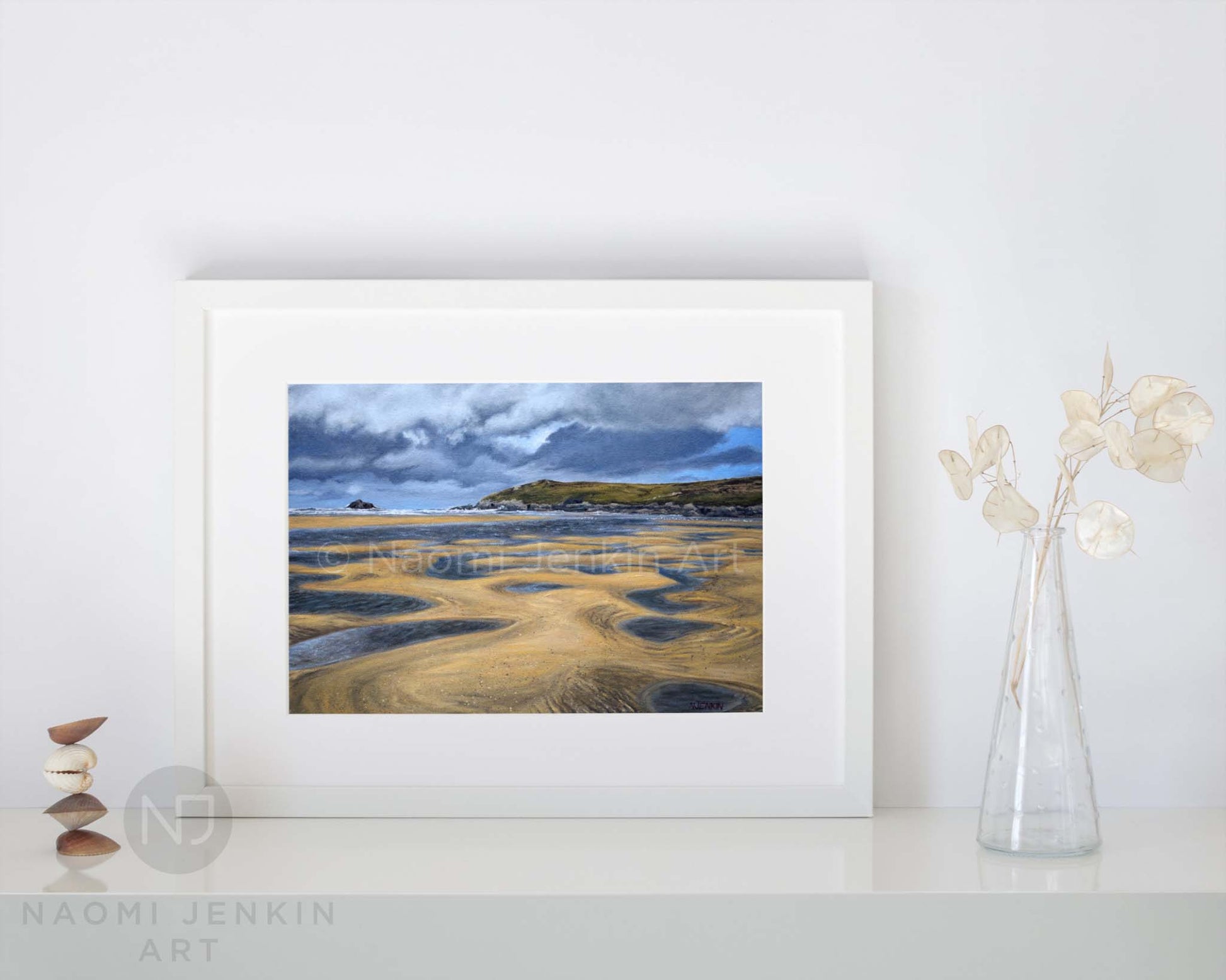 Framed fine art seascape print 'Low Tide At Crantock' on a shelf setting 