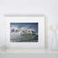 Framed fine art seascape print 'Ocean Turmoil' on a shelf setting 