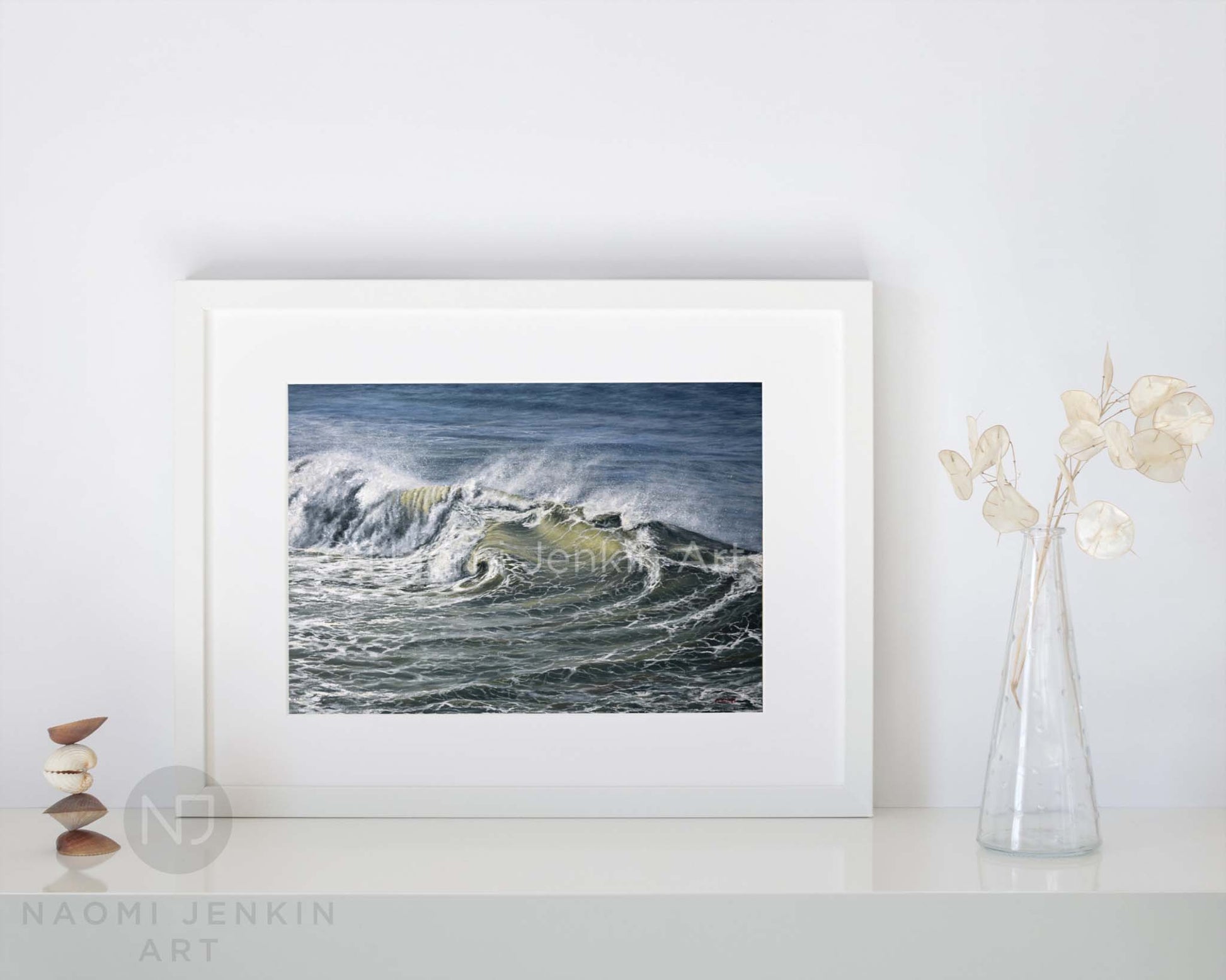 Framed fine art seascape print 'Ocean Turmoil' on a shelf setting 