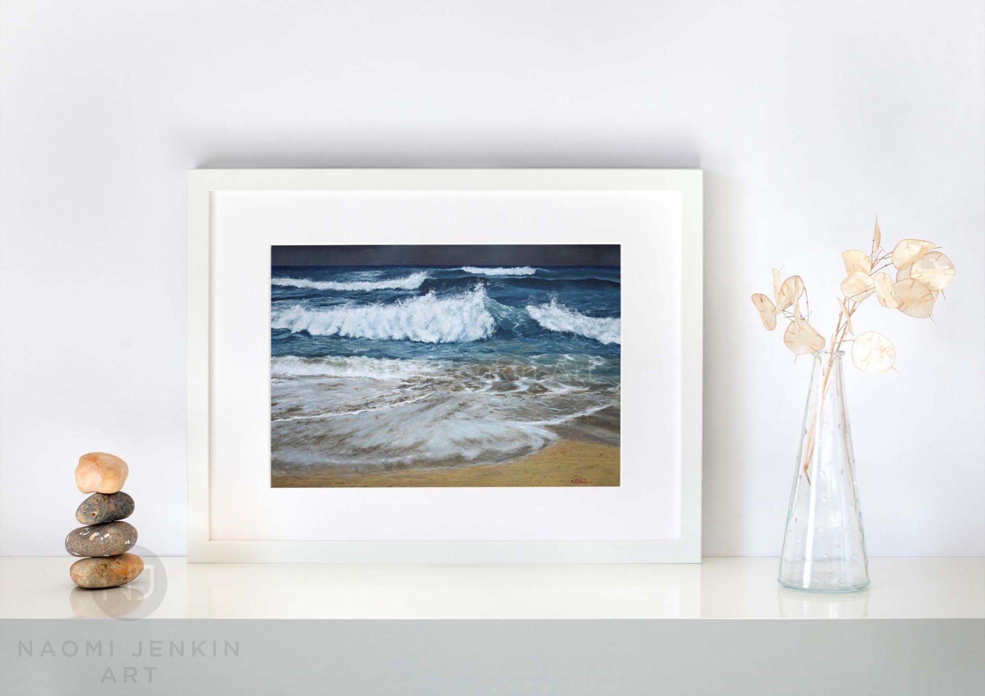 Framed fine art seascape print 'Stormy Seas, Constantine' on a shelf setting 