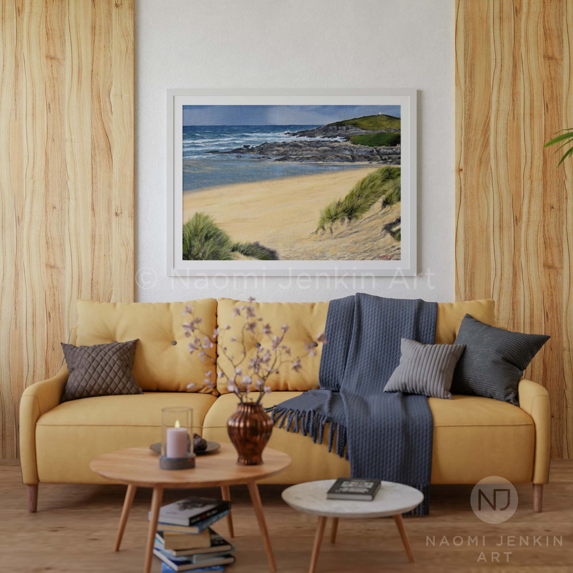Framed 'Autumn Showers Fistral' seascape print by Naomi Jenkin in a living room setting