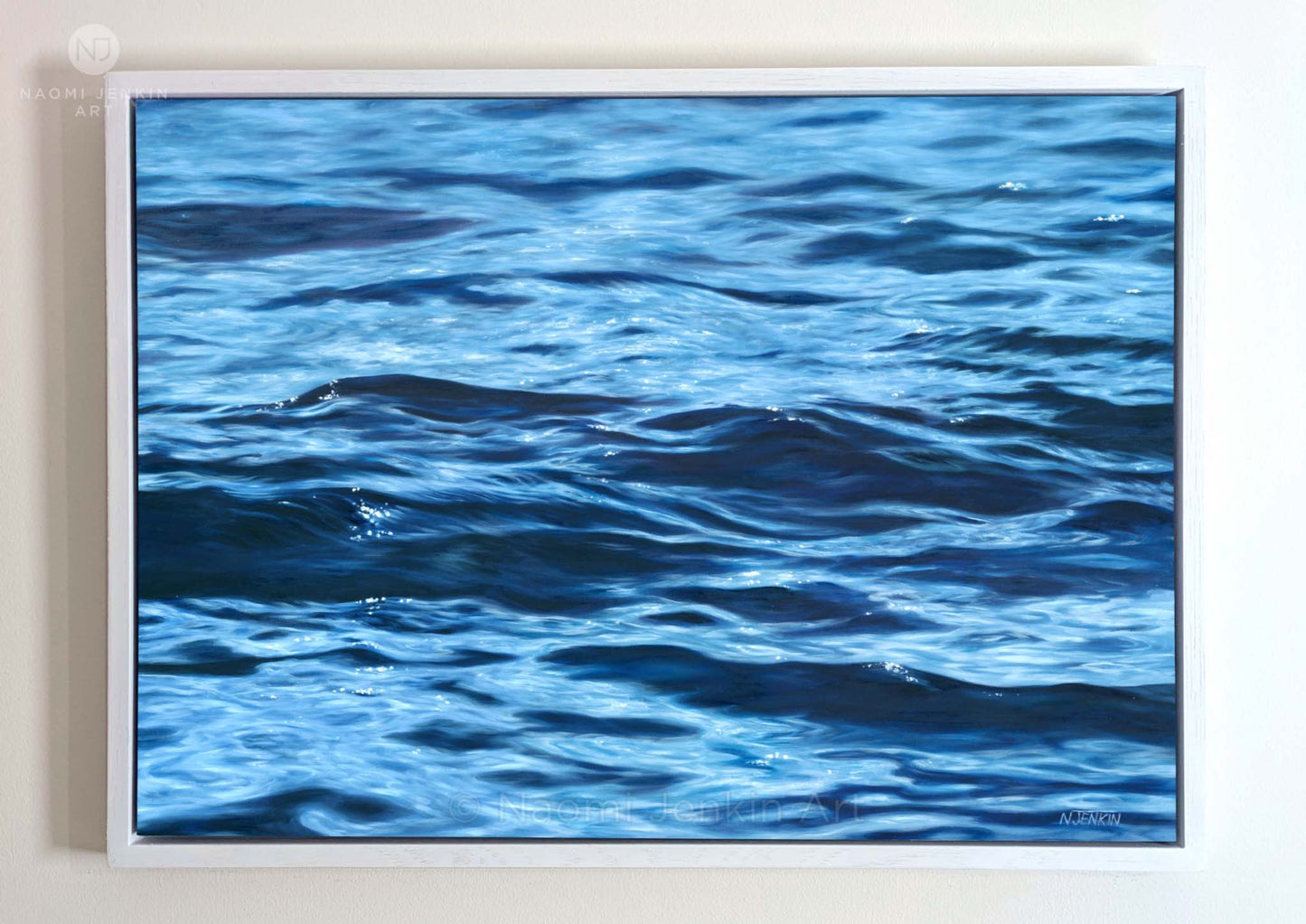 'Solace' - framed seascape painting of calm ocean ripples by Naomi Jenkin Art. Painted in oil on canvas. 