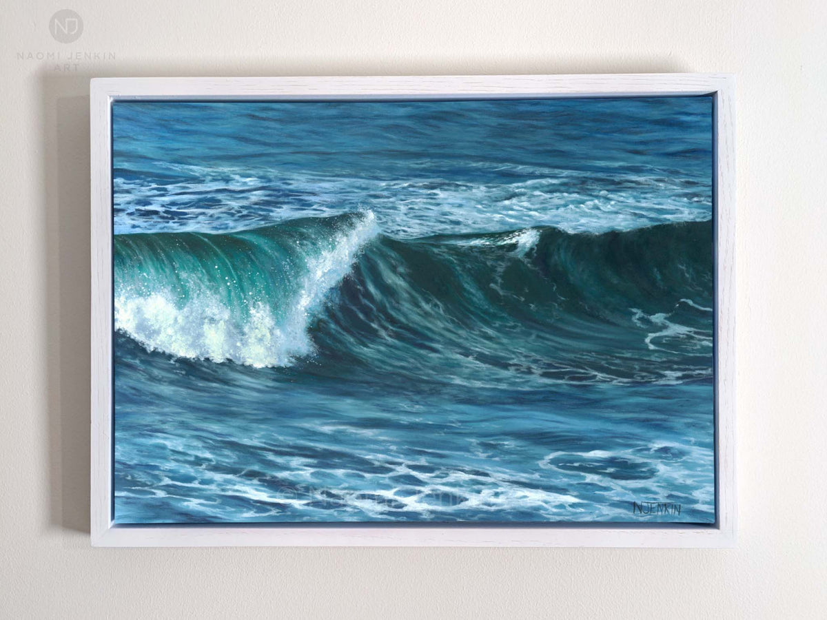 Winter Surf seascape painting by Naomi Jenkin in a white wooden tray frame.