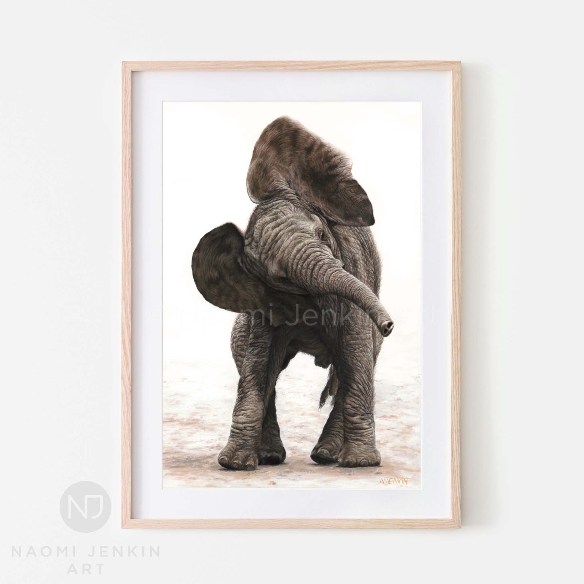 African elephant art print by Naomi Jenkin Art in a light brown wooden frame
