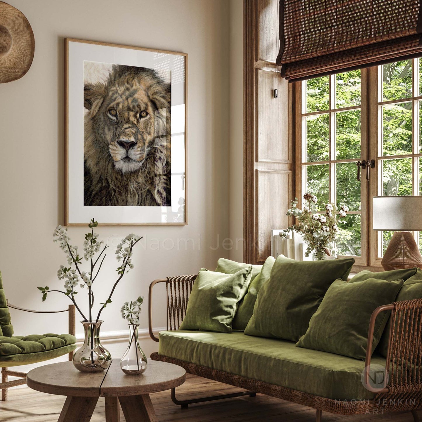 Framed giclée print of lion painting "Warrior" by Naomi Jenkin Art, displayed in a living room..