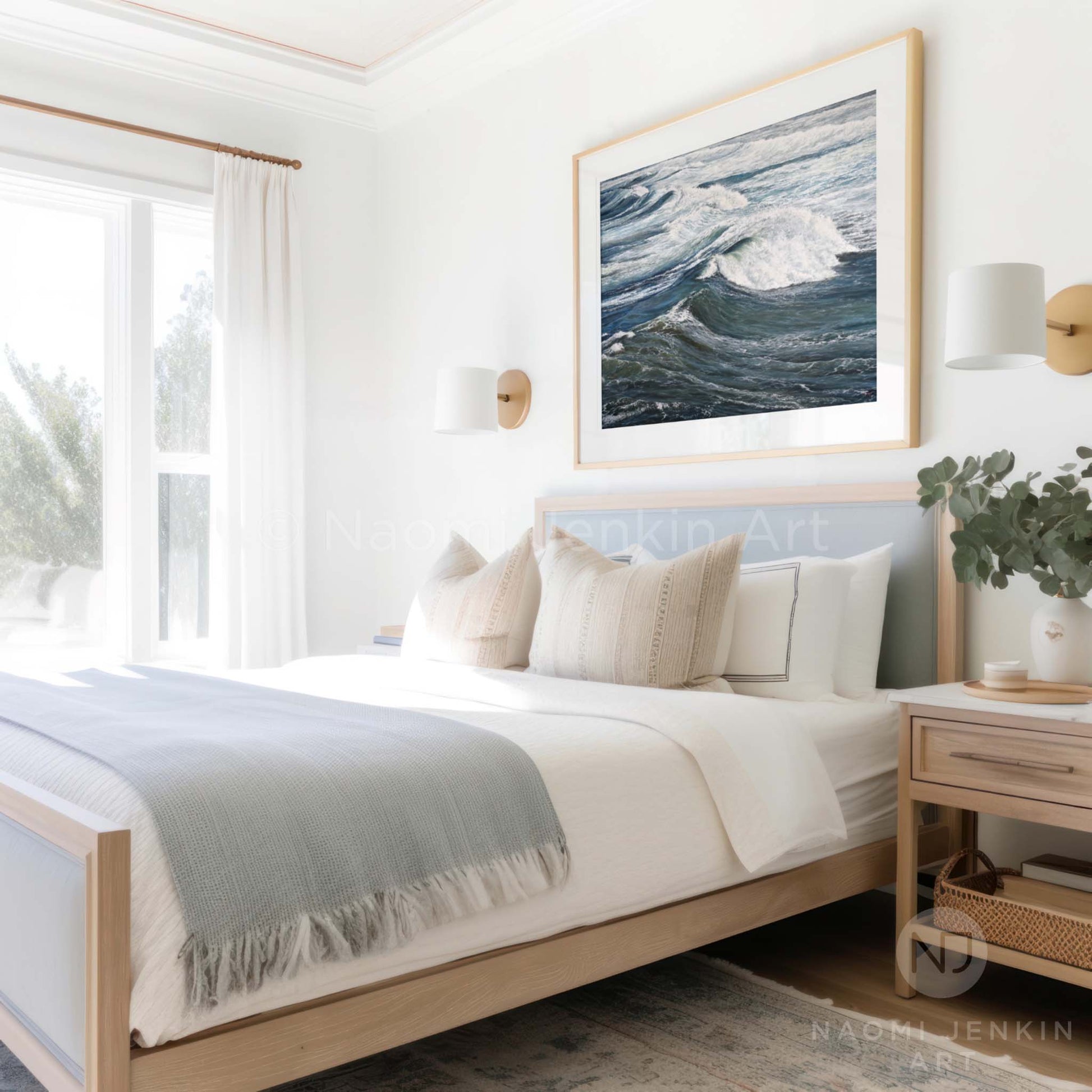 Framed seascape print 'Wind Swept Rollers' by seascape artist Naomi Jenkin in a bedroom setting