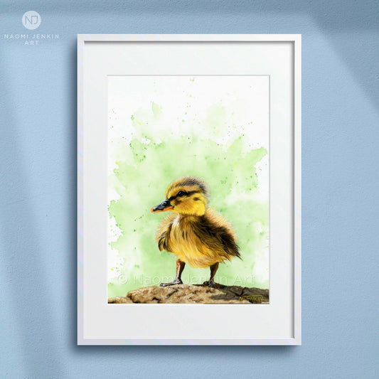 Framed artwork of a duckling drawing with a green painted background by Naomi Jenkin Art. 