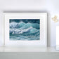 Curling Waves' seascape print by artist Naomi Jenkin Art in a white frame