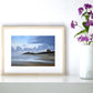 Beach print 'Dawn Over Fistral' by Naomi Jenkin Art in a wooden frame