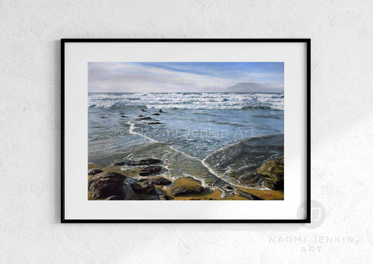 Seascape print of Watergate Bay titled 'Incoming Tide' by artist Naomi Jenkin Art in a black frame