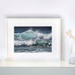 Framed wave seascape print 'Sunlit Surf' by seascape artist Naomi Jenkin on a shelf setting