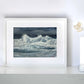 Seascape print titled 'Whipping Up a Storm' by artist Naomi Jenkin Art in a white frame