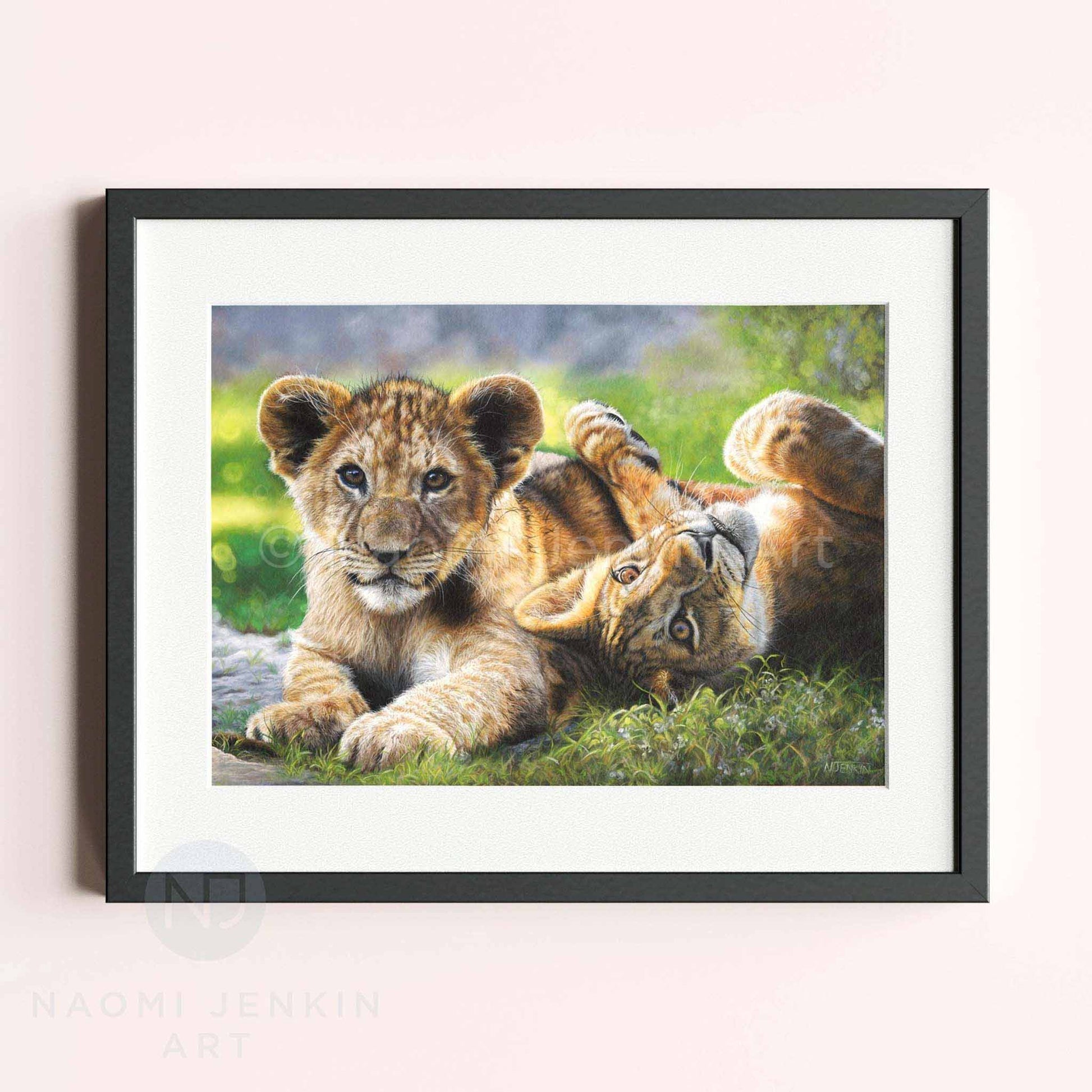 Framed art print of two lion cubs by wildlife artist Naomi Jenkin